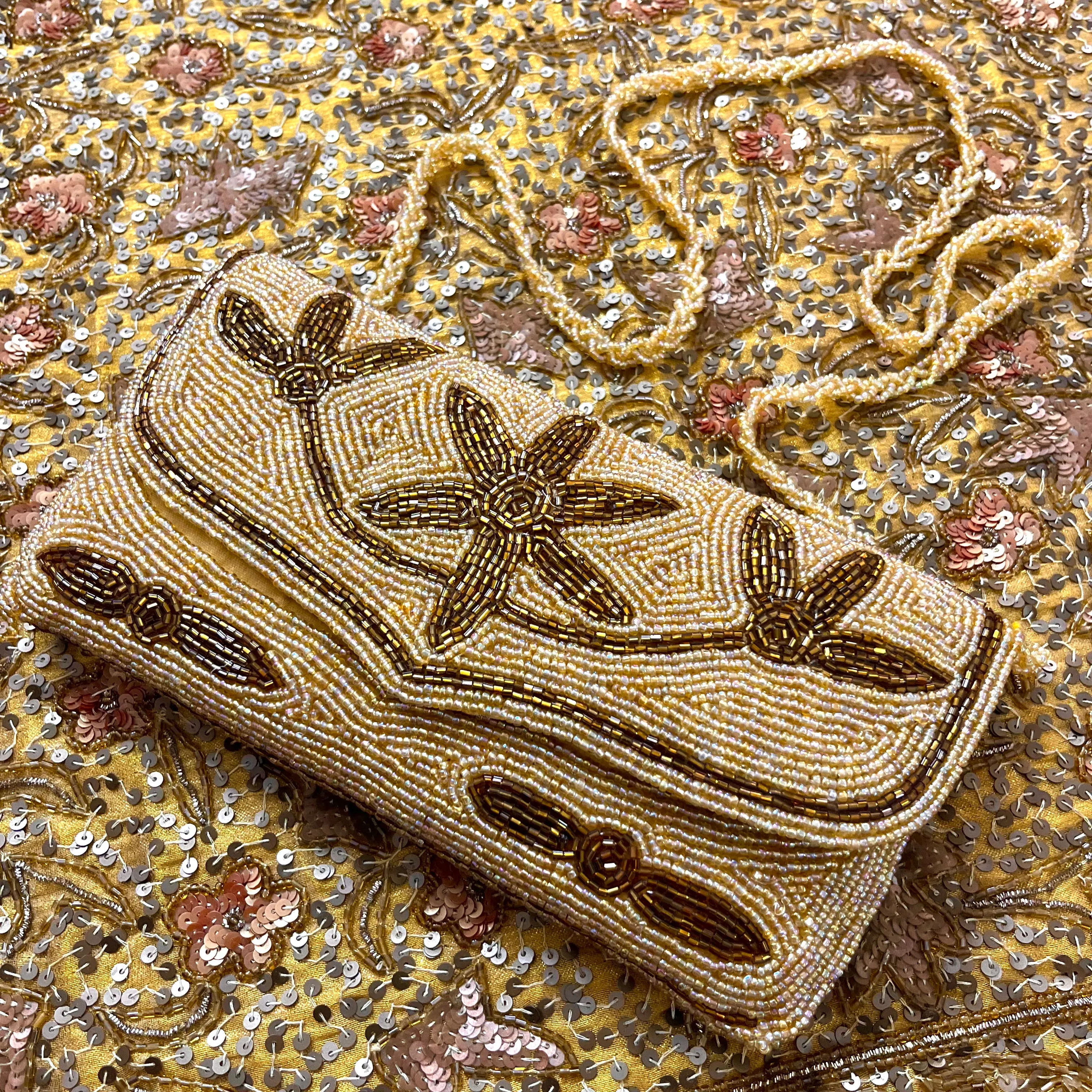 Golden bead embellished purse