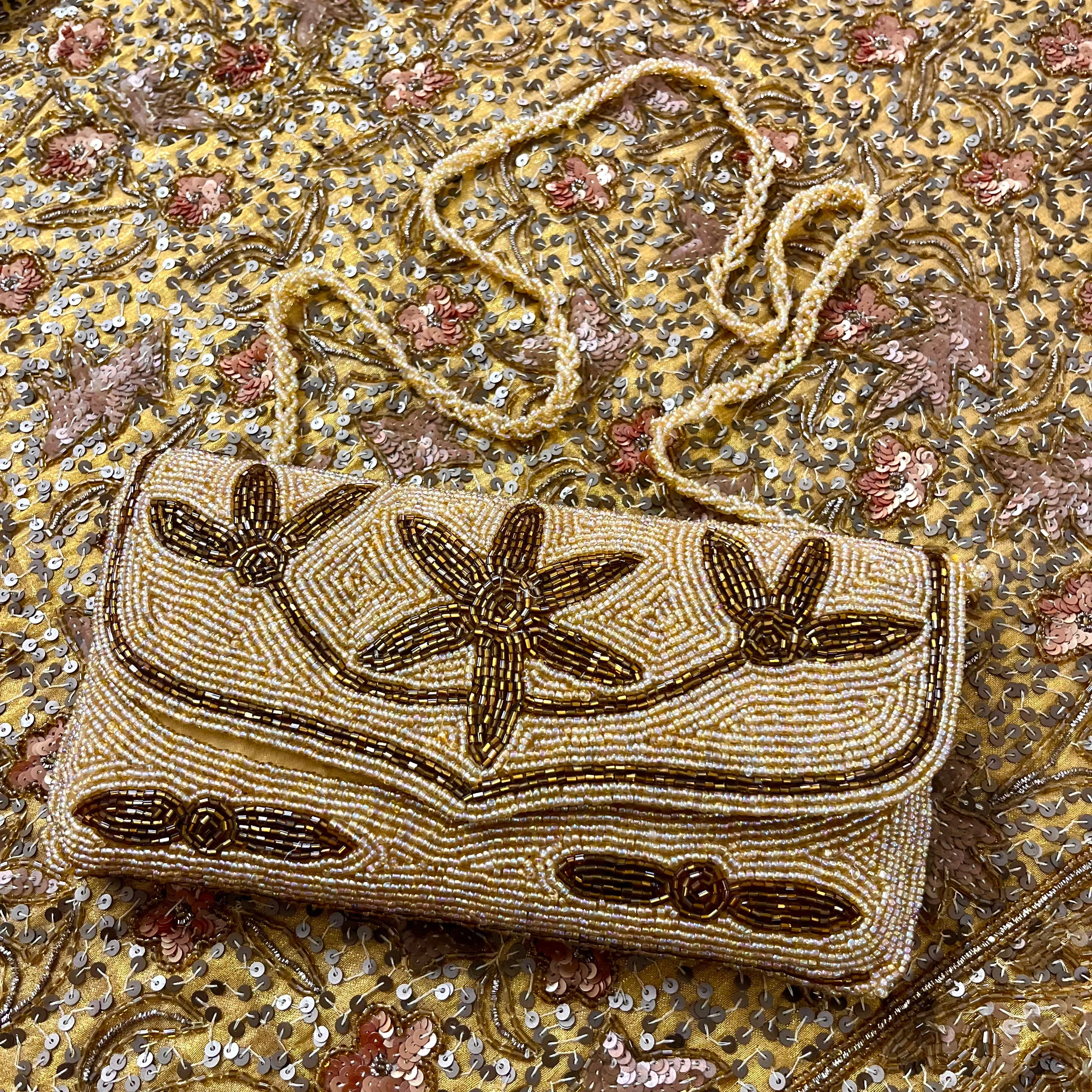 Golden bead embellished purse