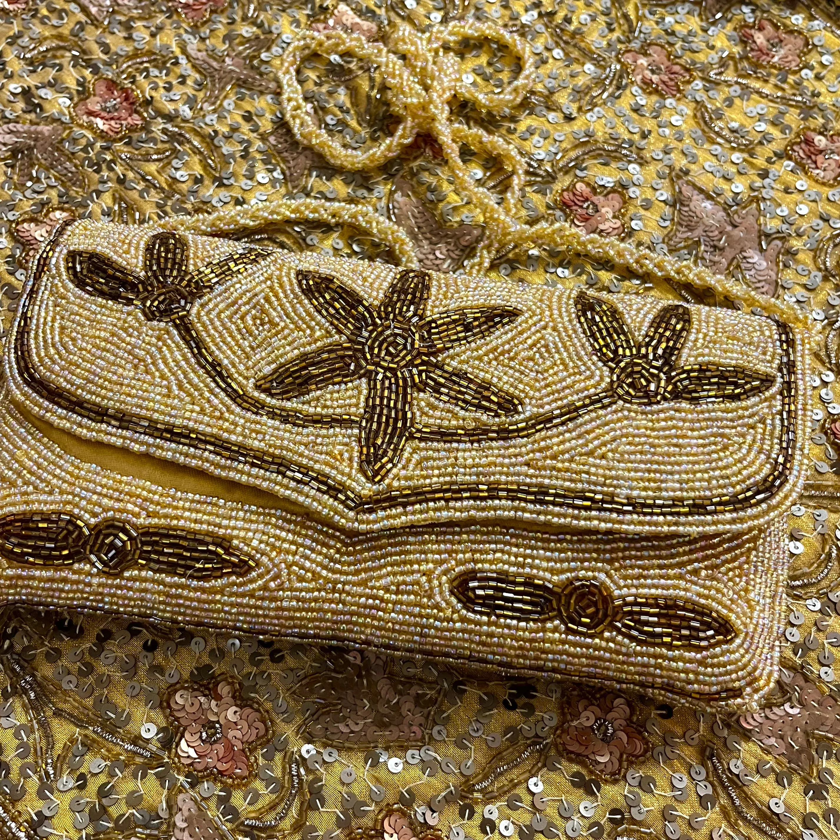 Golden bead embellished purse