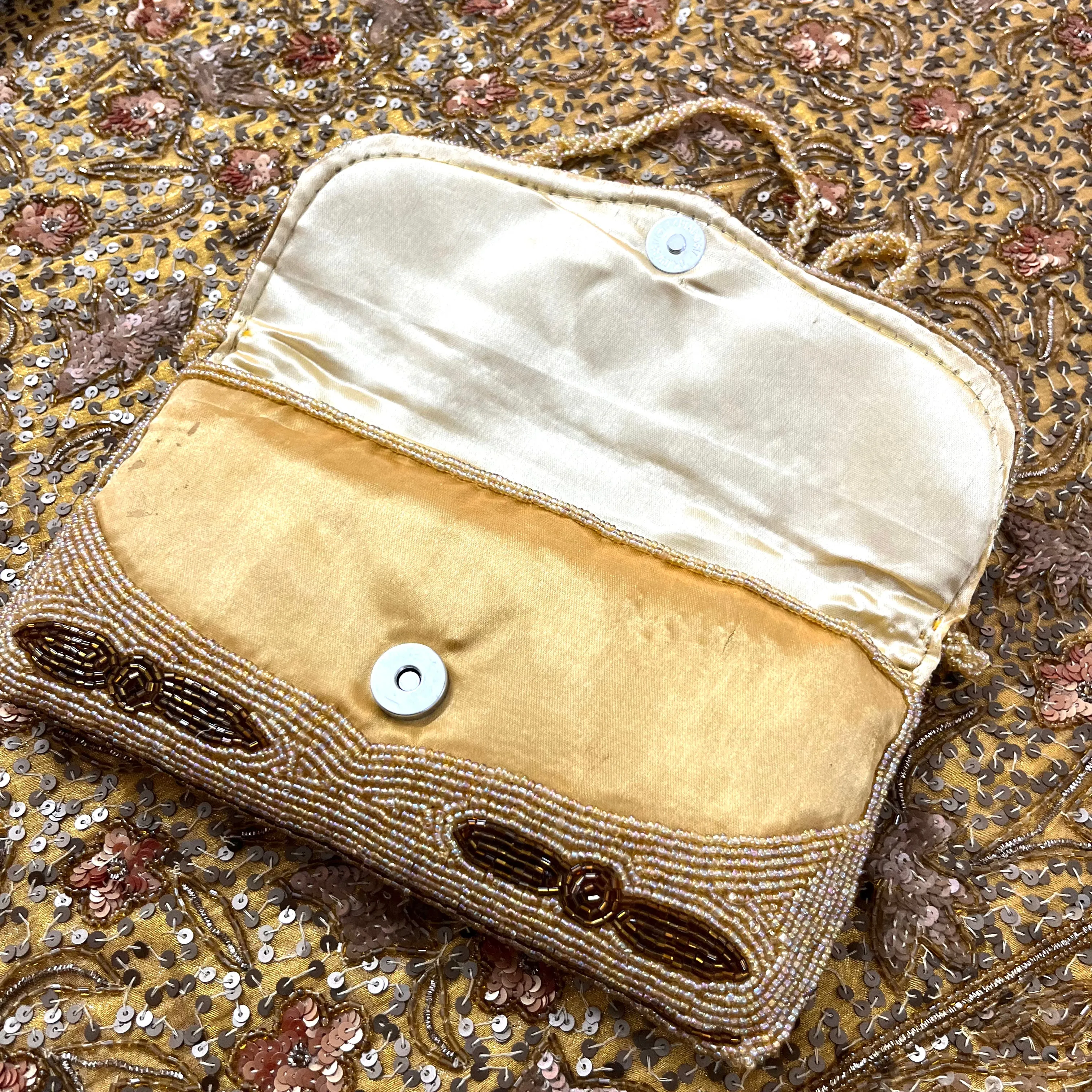 Golden bead embellished purse