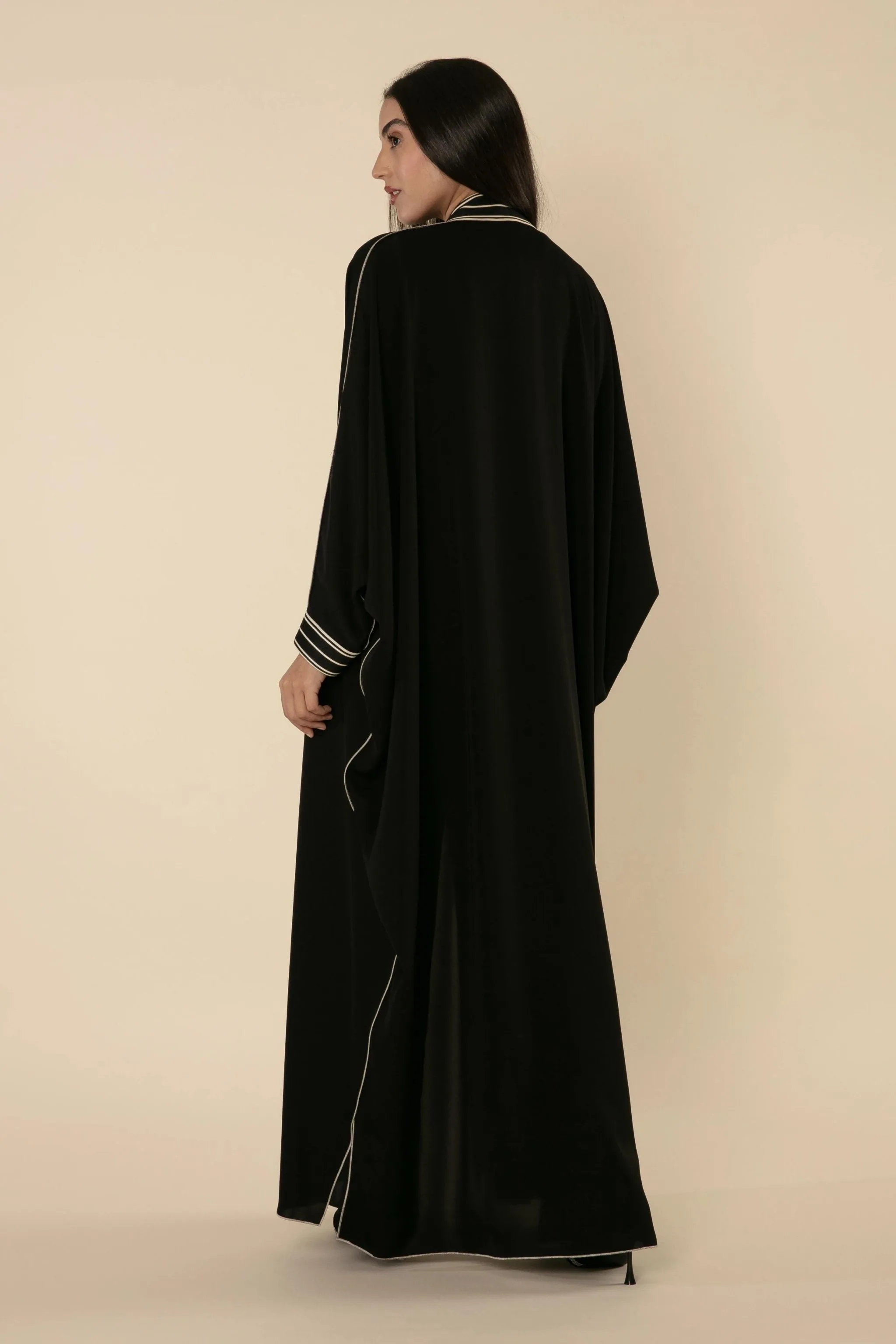 MIDNIGHT HARMONY: BLACK ABAYA WITH RIBBON DETAILING