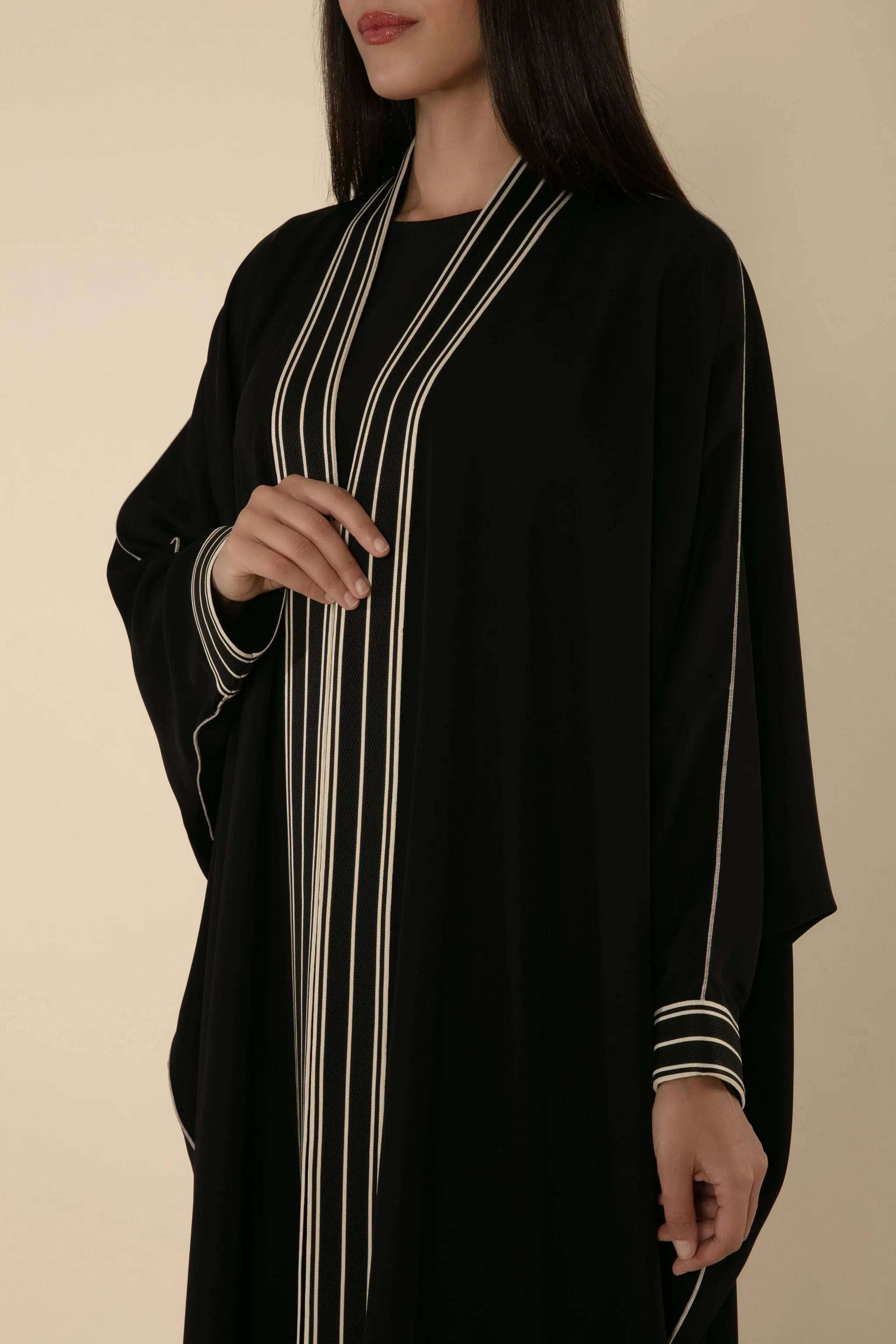 MIDNIGHT HARMONY: BLACK ABAYA WITH RIBBON DETAILING