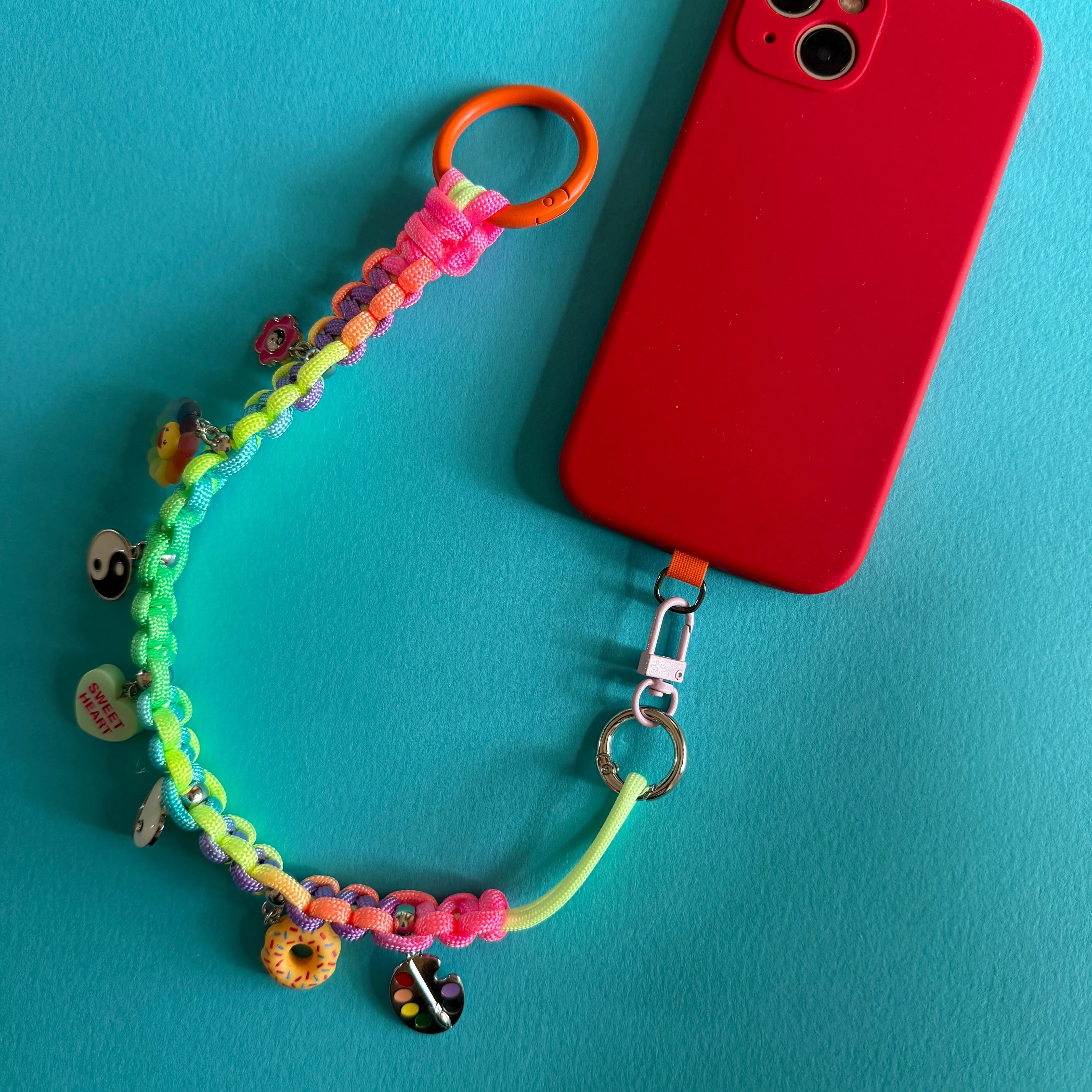 Phone wrist strap with charms