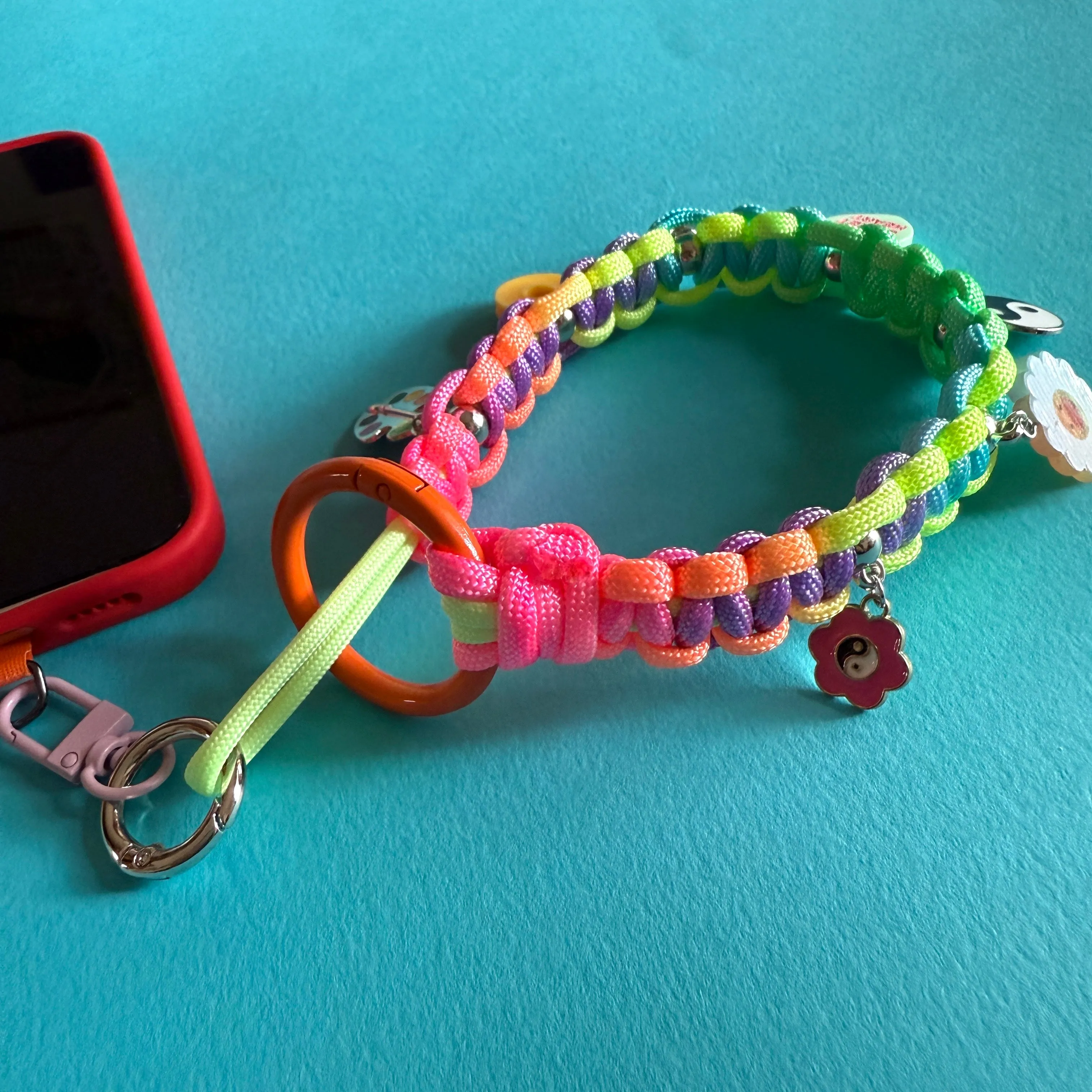 Phone wrist strap with charms